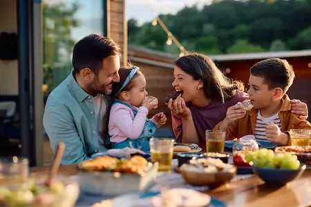 Family having a mosquito free picnic.